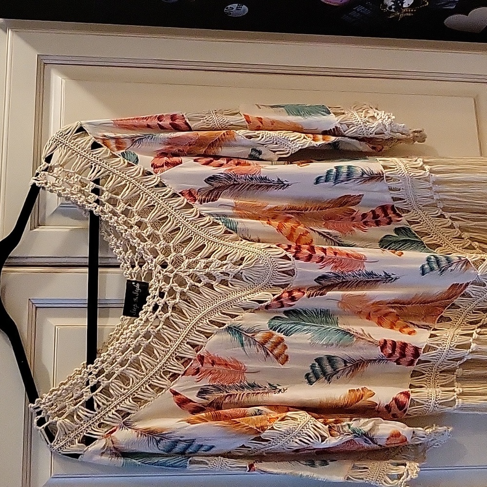 Loose top for warm weather. Fits like a large